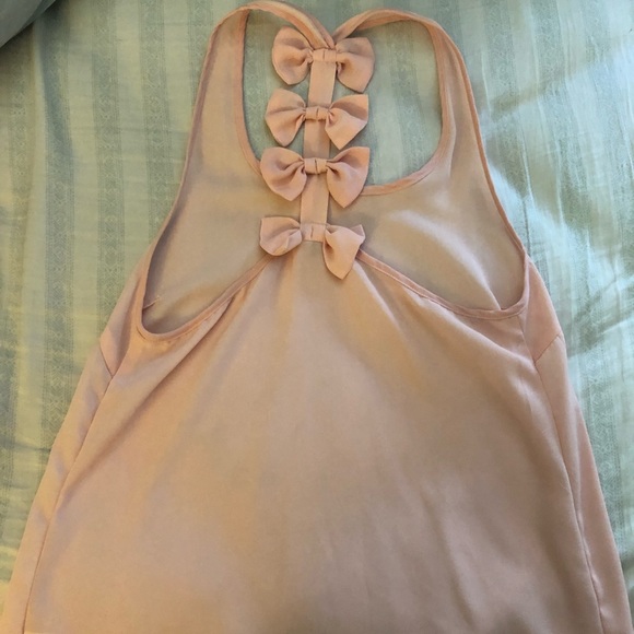 pink blouse, bows on the back of - Picture 2 of 2